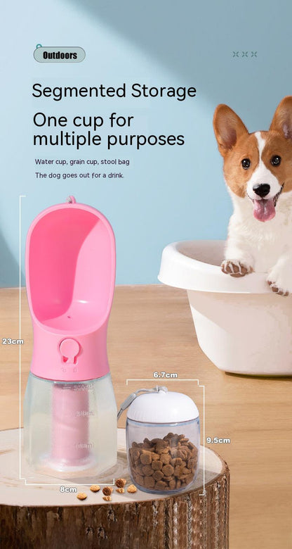 Pink segmented storage container with a dog and bowl on a wooden surface