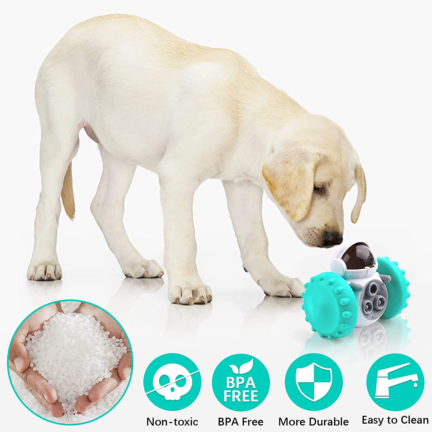 Dog playing with a teal and gray toy on a white background